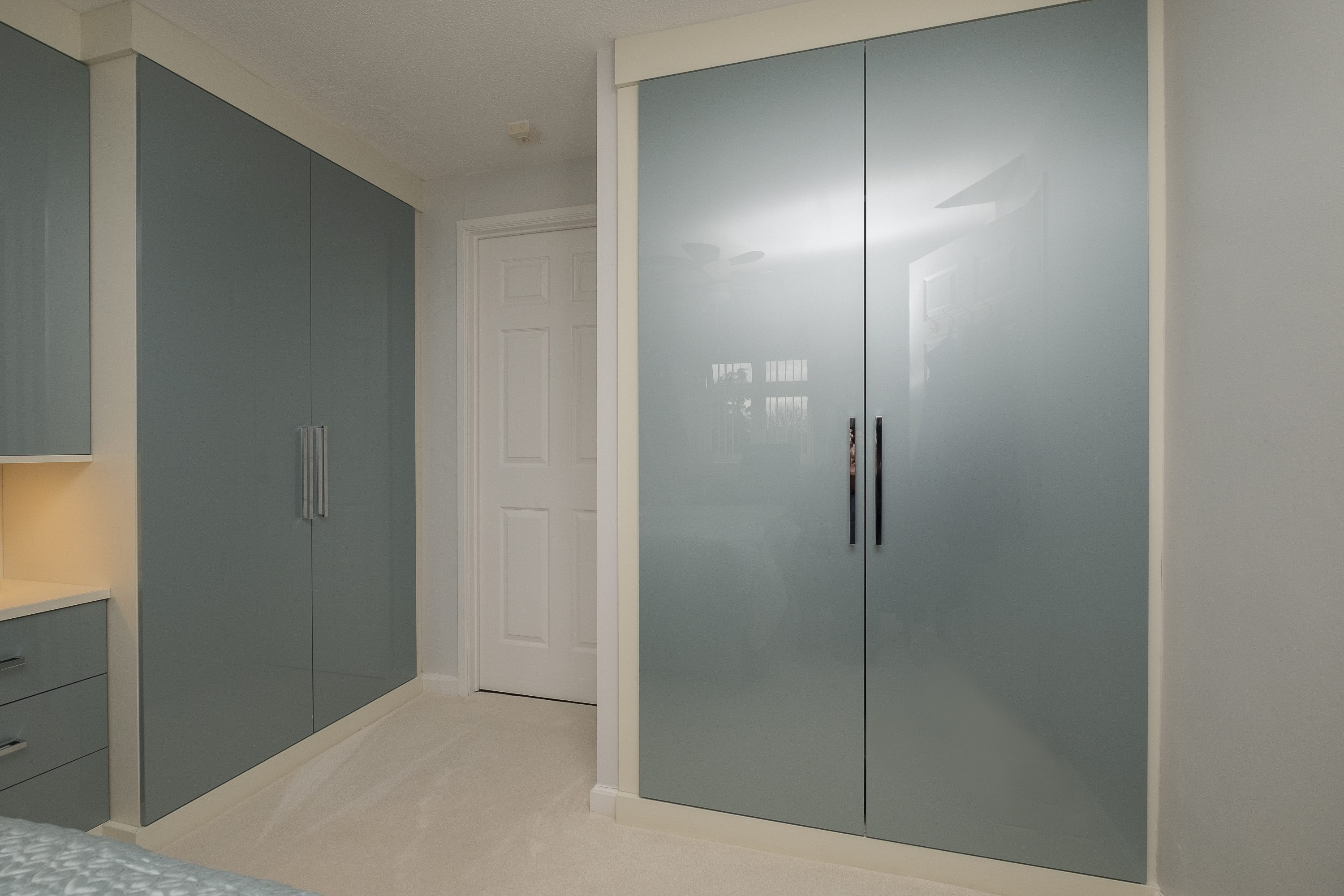 Blue Metallic Acrylic Doors with Invory Painted Oak Surround